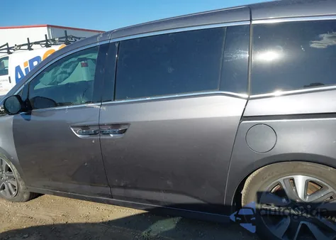 2014 Honda Odyssey Touring/Touring Elite z USA, uszkodzony, nr VIN 5FNRL5H91EB029367